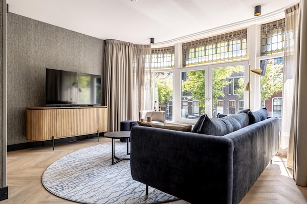 Sfeervol appartement aan Delftse gracht met karakteristieke erker - thumbnail 2