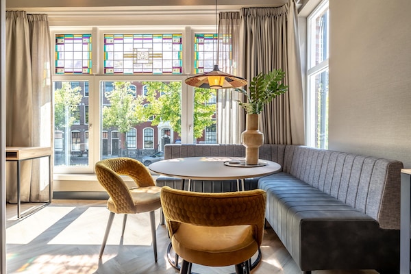 Sfeervol appartement aan Delftse gracht met karakteristieke erker - thumbnail 4