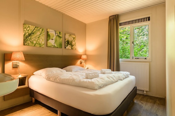 COPD-vriendelijke bungalow op autovrij Veluws vakantiepark met zwembad - thumbnail 4