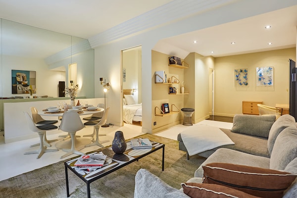 Stijlvol Triplex Appartement met Terras & Bioscoopzaal in het Hart van de Marais - thumbnail 1