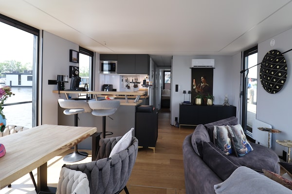 Luxe houseboat met sauna en dakterras op het Sneekermeer - thumbnail 2