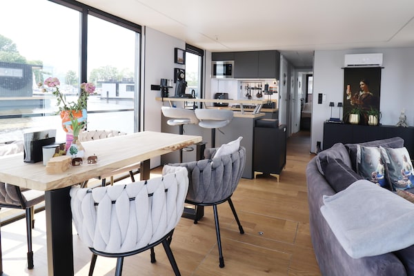 Luxe houseboat met sauna en dakterras op het Sneekermeer - thumbnail 3