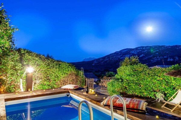 Authentiek vakantiehuis met zwembad en zeezicht bij Porto San Paolo - thumbnail 1