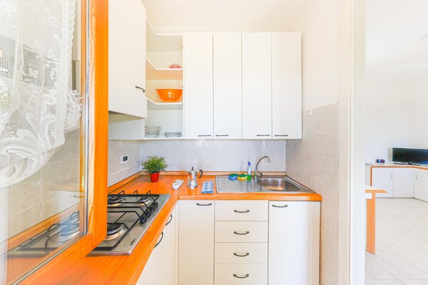 Rustiek appartement voor 4 op heuvelachtig park met zwembad, vlakbij zee - thumbnail 6