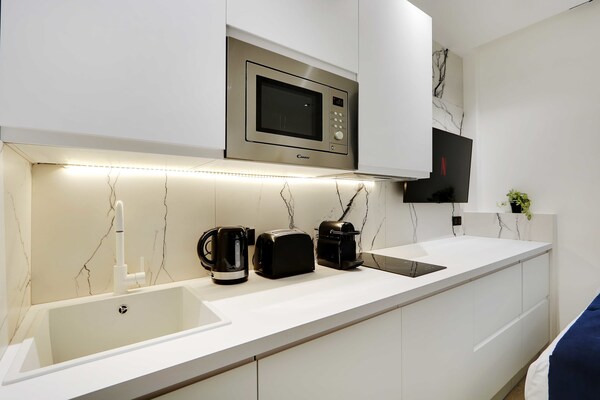 Stijlvolle studio in hartje 2e arrondissement Parijs – 16m² voor 2 personen - thumbnail 4