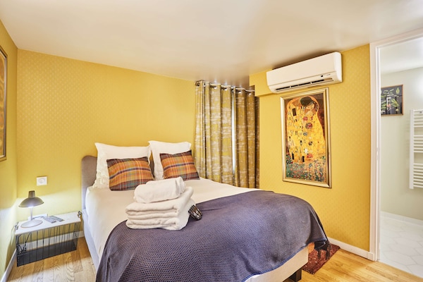Parijs triplex met airco, 2 slaapkamers en wasmachine in 10e arrondissement - thumbnail 2