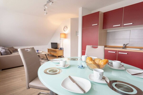 Zonovergoten appartement in Norddeich met overdekt terras en parkeerplaats - thumbnail 3
