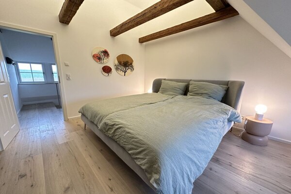 Stijlvol appartement met rieten dak aan de Noordzeekust bij Westerhever - thumbnail 6
