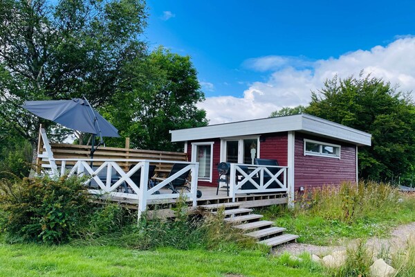 Modern vakantiehuis aan de golfbaan in Hörby voor 8 personen - thumbnail 1