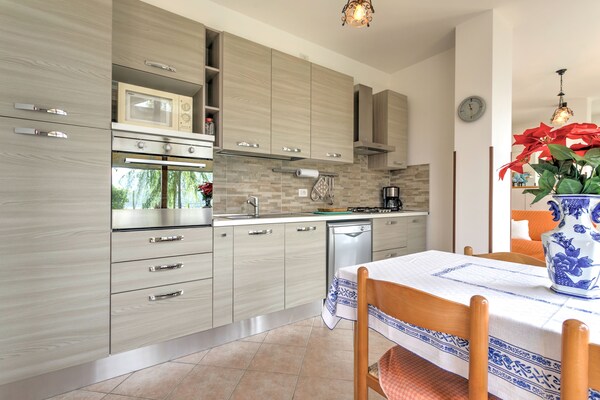 Panoramisch appartement aan het Comomeer met zwembad en tuin in Gravedona - thumbnail 4