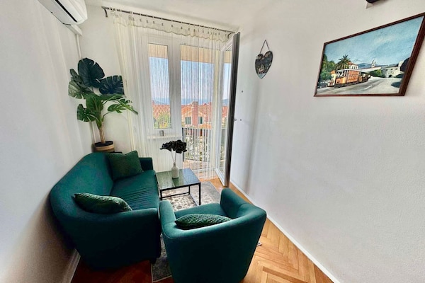 Knus appartement met privéterras en zeezicht, 10 min van de oude stad - thumbnail 2