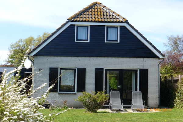 Modern vakantiehuis met tuin, 10 minuten lopen van strand Ouddorp - thumbnail 3