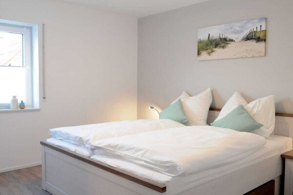 Licht vakantiehuis met balkon, op loopafstand van centrum Carolinensiel - thumbnail 3