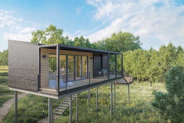 Moderne boomhut in Wangels – panoramisch uitzicht op 5 meter hoogte - thumbnail 1