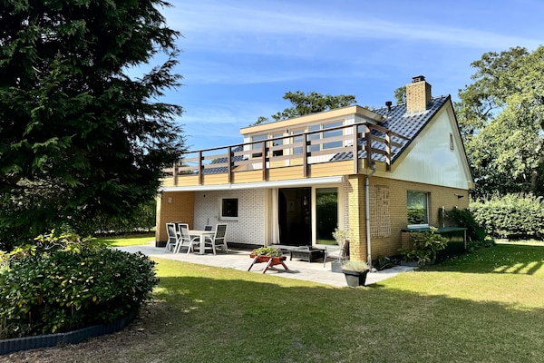 Vrijstaande luxe bungalow in het bos, 1km van strand Texel - thumbnail 1