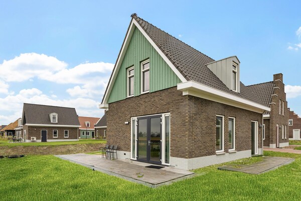 Vrijstaand watervilla Koggehuys met aanlegsteiger op Dormio Resort Medemblik - thumbnail 6