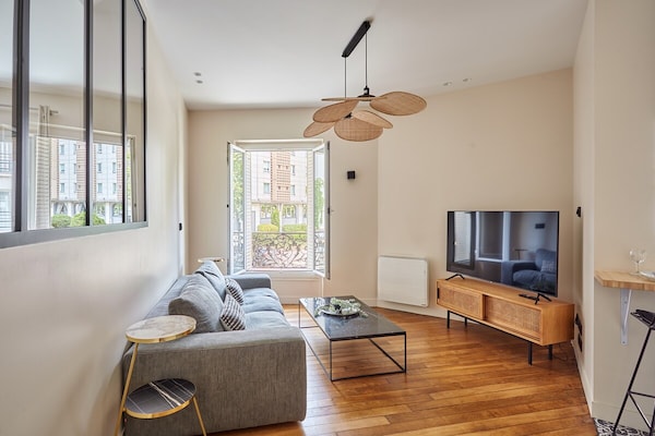 Modern appartement in Haussmann-pand midden in Parijs - thumbnail 1