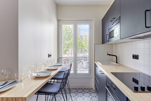 Modern appartement in Haussmann-pand midden in Parijs - thumbnail 4