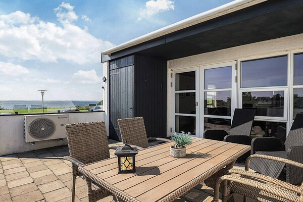 Duurzaam vakantiehuis bij Tranekær met zeezicht op 180 meter - thumbnail 2