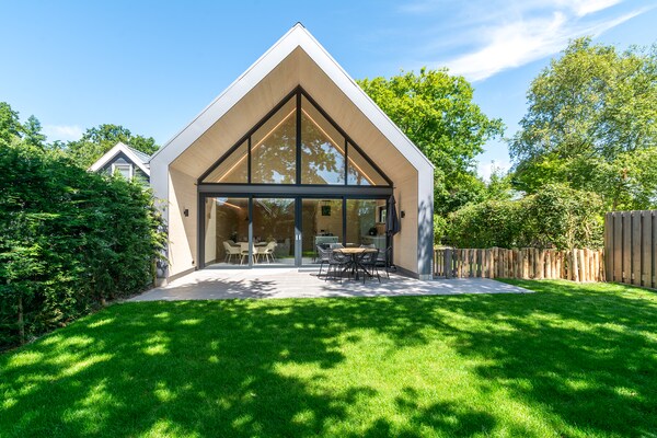 Luxe strandvilla Belkmer Beachhouse met omheinde tuin, 1,5km van zee - thumbnail 1