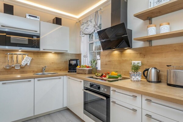 Luxe appartement direct aan het strand van Zingst met sauna en zeezicht - thumbnail 5