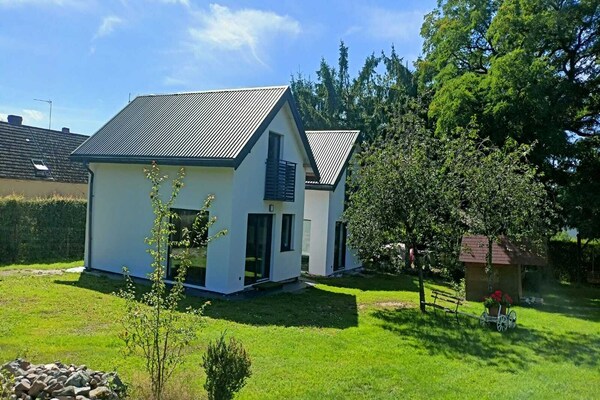 Nieuw vakantiehuis voor 7 personen met tuin, vlakbij zee en meer in Lędzin - thumbnail 2