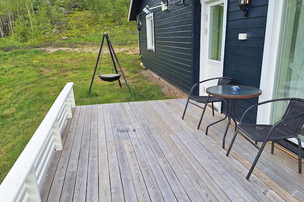 Modern vakantiehuis met sauna en panoramisch uitzicht op de Tana-rivier - thumbnail 2