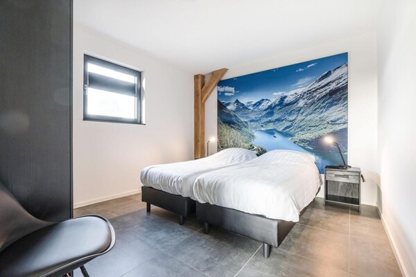 Luxe rietgedekte bungalow aan rustig vijver in Baarle-Nassau - thumbnail 5