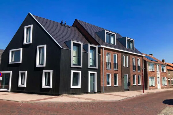 Charmante kustlodge in Zoutelande met tuin, op 150m van het strand - thumbnail 1
