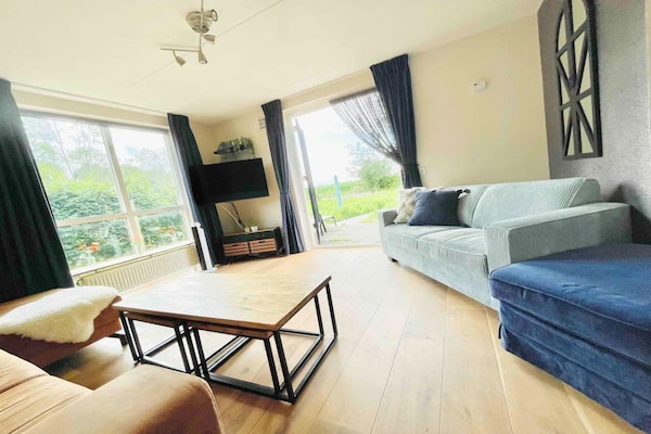 Luxe bosbungalow voor 6 pers. met omheinde tuin, huisdieren welkom in Ewijk - thumbnail 2
