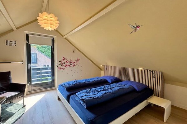Luxe vrijstaande villa met zonnepanelen en omheinde tuin in Ewijk - thumbnail 5