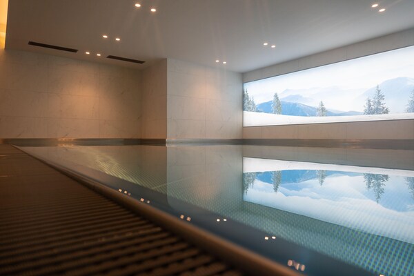 Licht en elegant appartement voor 9 personen in hartje Megève - thumbnail 6