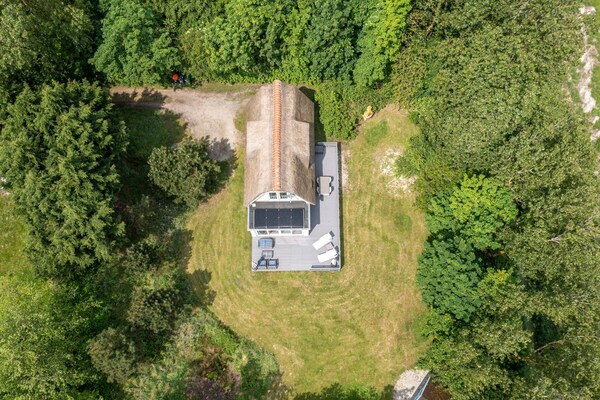 Sfeervol landhuis Eb & Vloed: rust en privacy in het bos bij De Koog - thumbnail 1