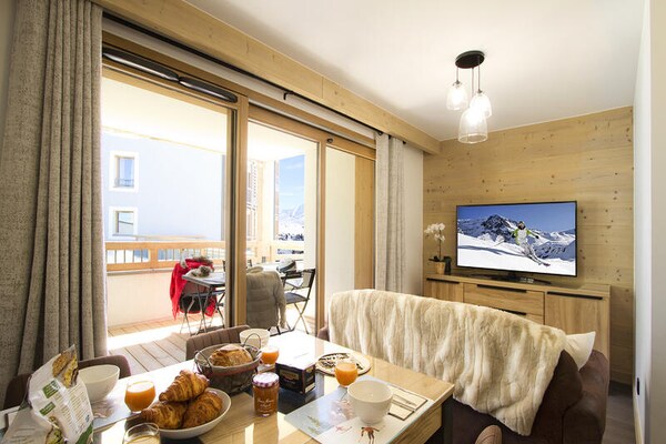 Luxe appartement in Huez met directe toegang tot de skipistes en wellness - thumbnail 1