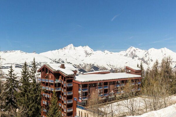 Zonnig appartement op de 8e verdieping met balkon en uitzicht op de Alpen - thumbnail 3