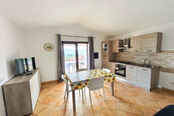 Licht appartement in Budoni met weids zeezicht en terras - thumbnail 4