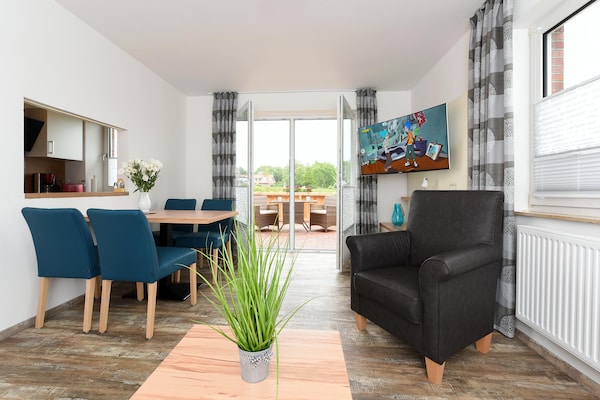 Op 350 m van zee: Modern appartement Haus zur Möwe 1 in Bensersiel - thumbnail 3