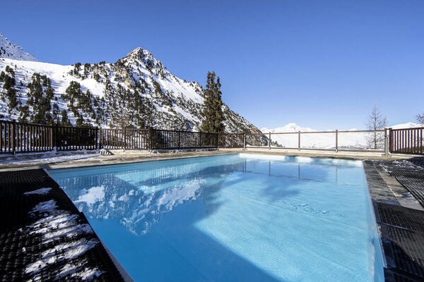 Luxe 5-sterren appartement in Arc 1950 met zwembad, sauna en uitzicht op de Mont Blanc - thumbnail 1