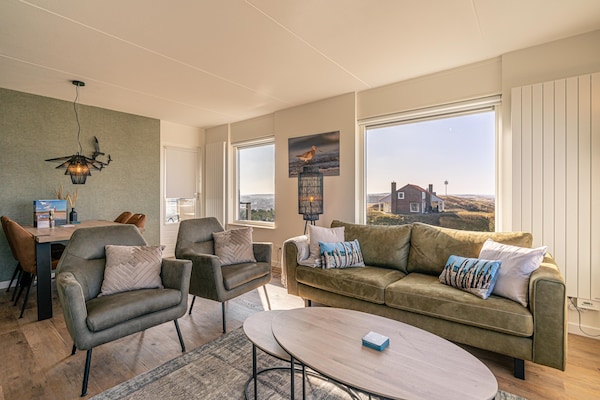 Modern hoekappartement met panoramisch zeezicht in bosrijke omgeving - thumbnail 3