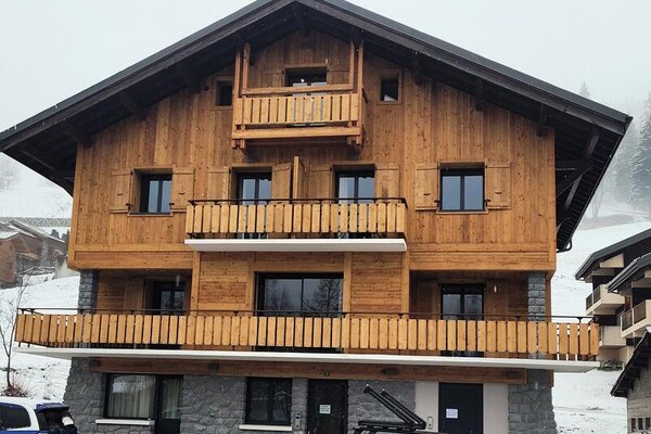 Licht appartement op 50m van de pistes met balkon in Les Gets - thumbnail 1