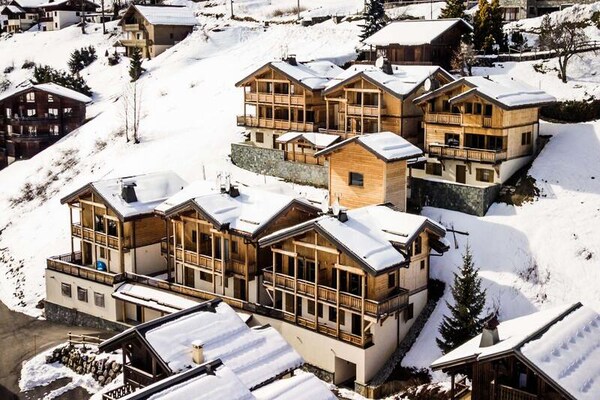 Luxe triplex appartement met panoramisch uitzicht op de pistes in Les Gets - thumbnail 1