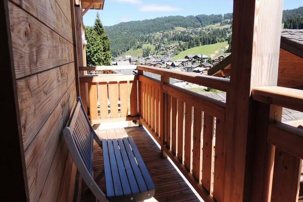 Luxe triplex appartement met panoramisch uitzicht op de pistes in Les Gets - thumbnail 3