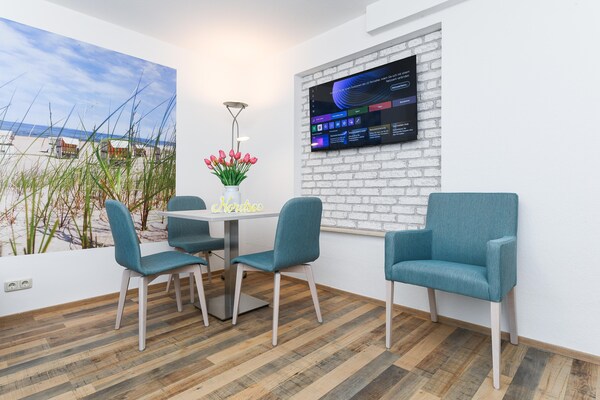 Licht appartement met wintertuin op loopafstand van het strand in Bensersiel - thumbnail 5