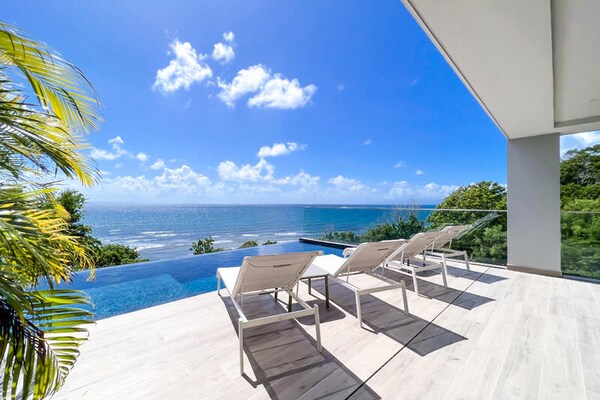 Villa Corail Bleu: Luxe appartement direct aan zee in Saint-François - thumbnail 2
