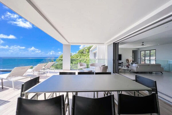 Villa Corail Bleu: Luxe appartement direct aan zee in Saint-François - thumbnail 3