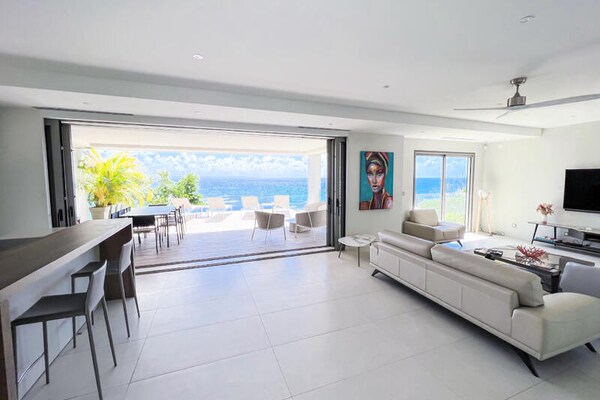 Villa Corail Bleu: Luxe appartement direct aan zee in Saint-François - thumbnail 5