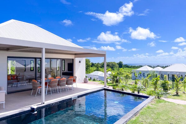 Luxe villa met privézwembad en zeezicht in Saint-François - thumbnail 2