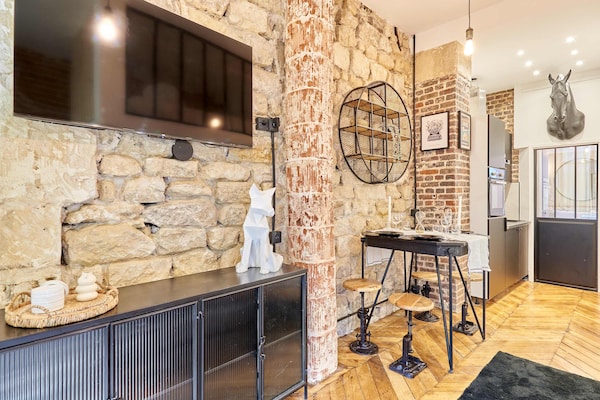 Licht appartement met mezzanine in Parijs' 20e arrondissement - thumbnail 4