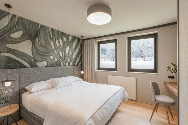Rustiek appartement aan de golfbaan met uitzicht op de Kitzsteinhorn - thumbnail 5