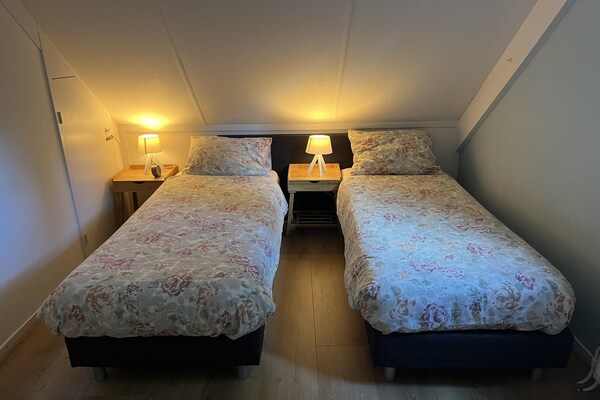 Vrijstaande bungalow met jacuzzi in groen vakantiepark Ewijk - thumbnail 5
